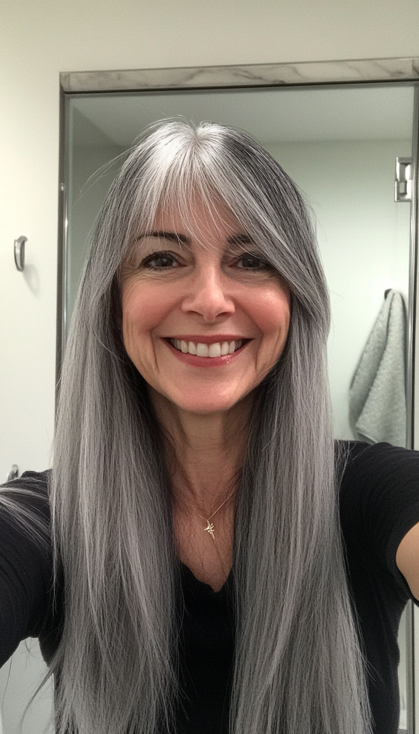 19. Blunt Cut with Wispy Bangs in Soft Black (Long Hairstyles For Women Over 60) - Long Hairstyles For Women Over 60